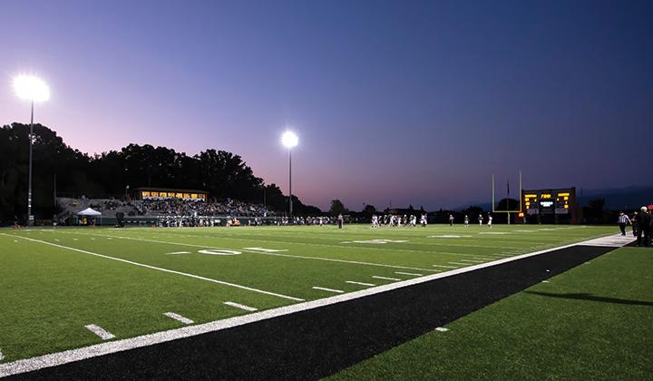 Football game at dusk in Raabe Stadium